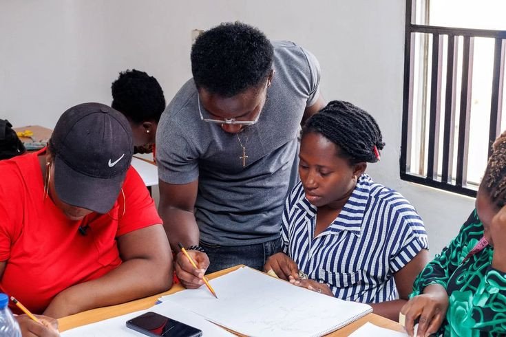 Mentor coaching a small group of test-prep students